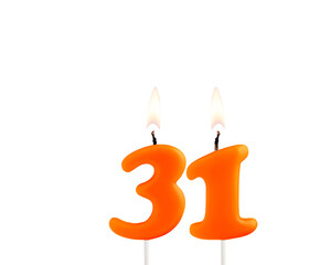 Orange birthday candle on white background - Number 31
