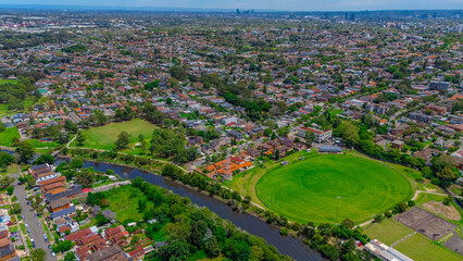 Panoramic aerial drone view of western Sydney Suburbs of Canterbury Burwood Ashfield Marrickville...