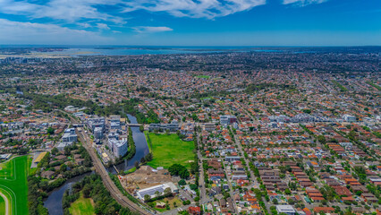 Panoramic aerial drone view of western Sydney Suburbs of Canterbury Burwood Ashfield Marrickville...