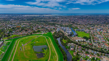 Panoramic aerial drone view of western Sydney Suburbs of Canterbury Burwood Ashfield Marrickville...