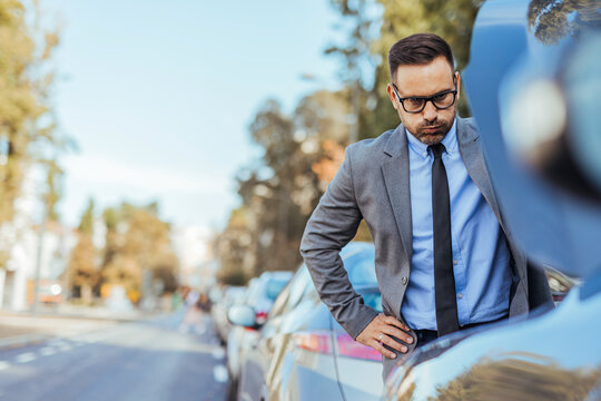 Businessman Stuck in Traffic Jam Looking Stressed on Busy Road