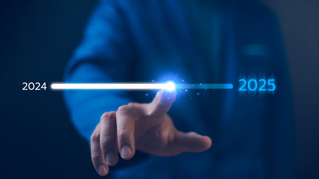 Businessman touch on loading progress from 2023 to 2025,Planning and challenge strategy in new year 2024 Concept. New business startup to 2025. New year 2025 is loading, calendar date, end of the year