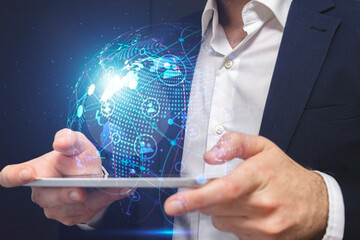 person holding digital tablet