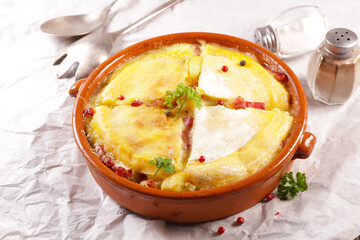 tartiflette- baked potato with bacon and cheese