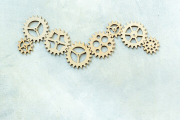 Chain of gears connected together. Corporate work and business process concept