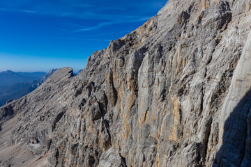 Monte Civetta in the Dolomites is a prominent mountain known for its vertical rock walls and alpine beauty. Ideal for photography, it features rugged peaks, dramatic cliffs, and scenic natural landsca