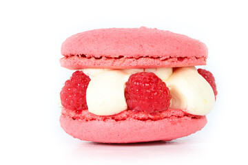 Raspberry macaroon on a white background