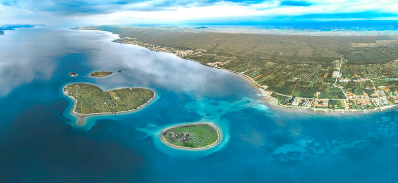 Aerial panorama of Island Galesnjak and the coastal mainland near the island. Adriatic Sea, Zadar archipelago, Dalmatia. Travel in Croatia