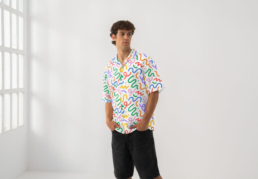 Mockup Of Man Wearing Customized Shirt In Studio