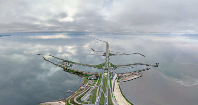 Panorama  afsluitdijk with water discharge sluices in IJsselmeer lake