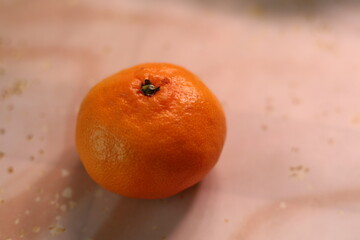 Orange tangerine. The texture of the peel. Abstract background. New Year's mood.