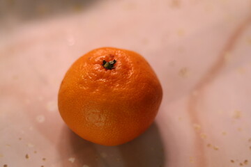 Orange tangerine. The texture of the peel. Abstract background. New Year's mood.