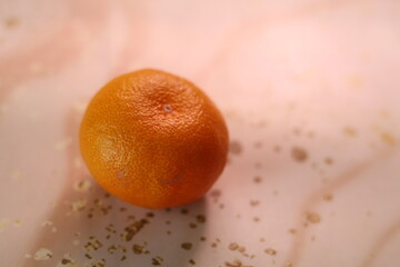 Orange tangerine. The texture of the peel. Abstract background. New Year's mood.