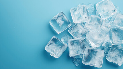 Obraz premium Close-up of transparent ice cubes on a blue background, showcasing their texture and clarity.
