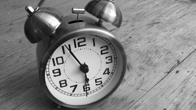 Time lapse of an Alarm clock set for  6 am  