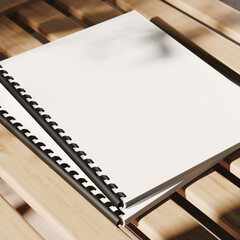 Two comb bound books on wooden rails mockup. 3D rendering