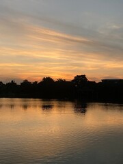 Obraz premium sunset over the river