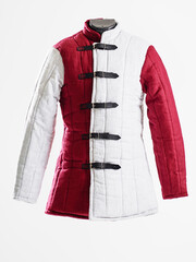 Historical fashion. Medieval knight cloth. Padded jacket gambeson.