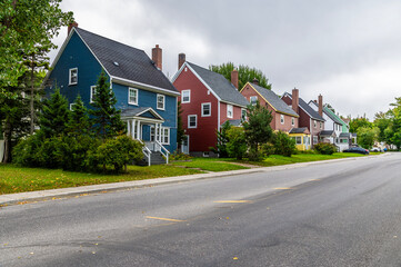A view of colorful house in a residential street in Corner Brook in Newfoundland, Canada in the fall