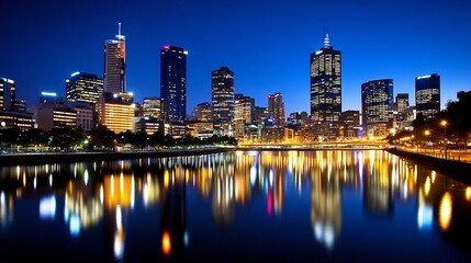 Fototapeta premium Radiant Cityscape at Nightfall:A Mesmerizing Urban Panorama of Glittering Skylines and Tranquil