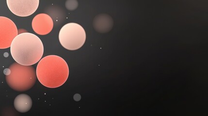 A black background with a bunch of red and pink spheres