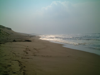 Misty Beach at Dusk