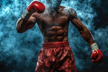 A boxer wearing red boxing gloves and shorts stands in the center