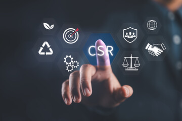 CSR concept. Corporate Social Responsibility, Businessman presents CSR related icons, sustainability, ethics, community, corporate social responsibility, social, environmental concerns in business.