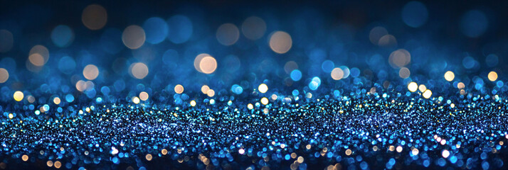 Abstract blue color glitter background with blurred bokeh. Luxury banner template for new year, Christmas, gender party or holiday cards with space for text.