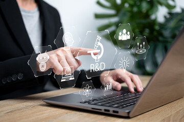 R&D, Research and Development concept, Businesswomen use technology and software development R and...