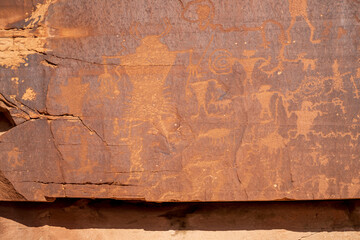 Detail of indigenous culture Petroglyphs etch in the walls along Potash Road in Moab Utah