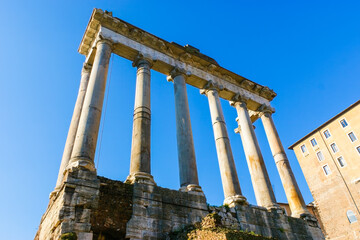 The ruins of Temple of Saturn in Roman Forum, Rome, Italy
