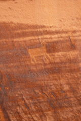 Detail of indigenous culture Petroglyphs etch in the walls along Potash Road in Moab Utah