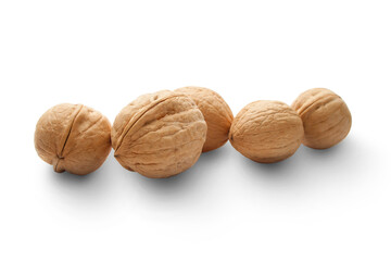 Heap of walnuts on white
