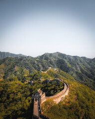 Fototapeta premium The Great Wall of China, stretching over 13,000 miles, is an ancient engineering marvel built to protect against invasions, symbolizing the rich history and resilience of the Chinese civilization.