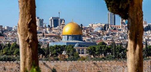 Golden dome of the Al Aqsa Mosque and the Jerusalem skyline as seen from the Mount of Olives
