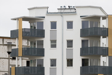 Multi-family apartment block with lots of windows