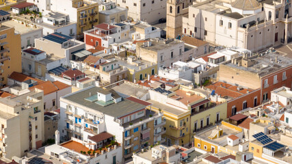 Aerial view of houses, buildings, apartments and roof of Manfredonia, in the province of Foggia, in...