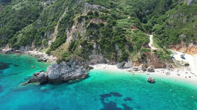Drone flight over beautiful turquoise water and sea along the coast in Kefalonia Greece