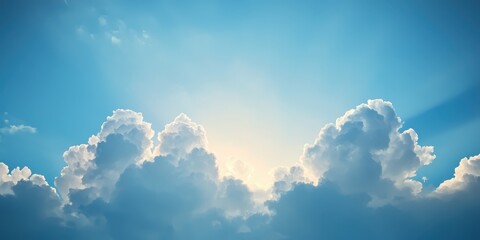 Bright blue sky with fluffy clouds illuminated by soft sunlight.