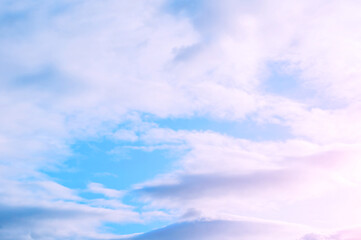 Sunset sky natural view, cumulus clouds floating in the serene sunset sky
