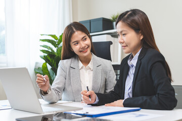 Business meeting, asian group woman brainstorm analysis on graph data of cost plan or document, paperwork and discussing in board room on table at office. People working together, financial advisor.