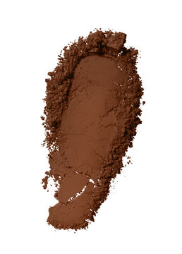 Swatch texture of brown loose powder for face makeup on an isolated white background. For dark skinned women. Eye shadow or sculptor or bronzer