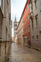 Empty street in the old town of  Zadar leading to the ancient Cathedral of St. Anastasia