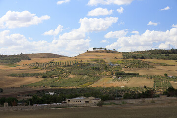 Road to Gravina in Puglia on a sunny summer day, province of Bari, Apulia, southern Italy.