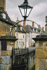 Beautiful English Street in Stamford with Lincolnshire Limestone Houses and Buildings in the Autumn, quintessential town and city in England © Liam