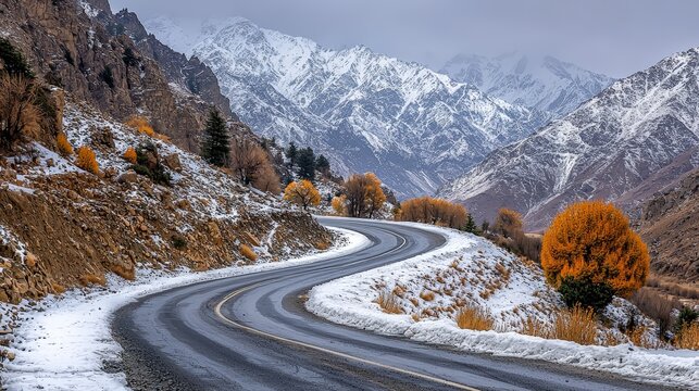 Karakoram Highway winding through snowy peaks