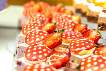 Fruit Mousse Pastries with Cream Cheese and Fresh Strawberries, Close-Up