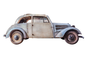 Barnfind of a wrecked oldtimer car with broken wooden parts