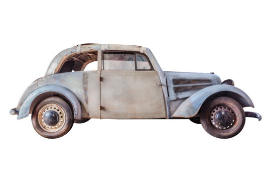 Barnfind of a wrecked oldtimer car with broken wooden parts